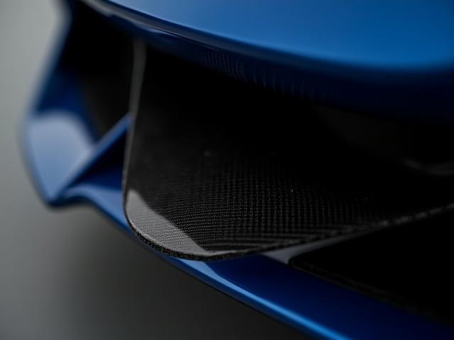 Bespoke carbon fiber aerodynamic components for a supercar