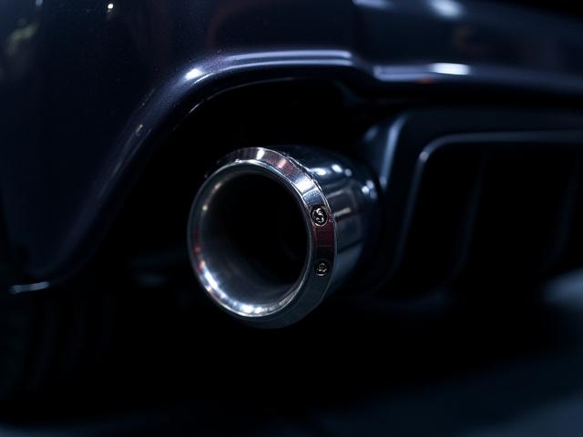 High-performance titanium exhaust system for a supercar